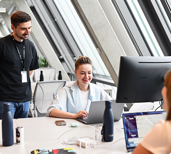 People working at their desks in the Berlin hub
