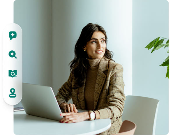 Person using laptop and looking away
