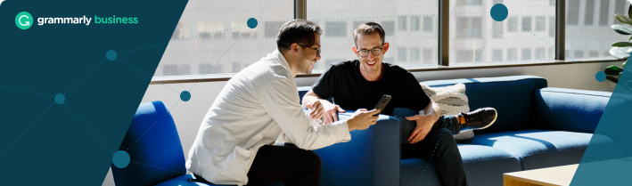 People sitting on a couch with Grammarly Business logo